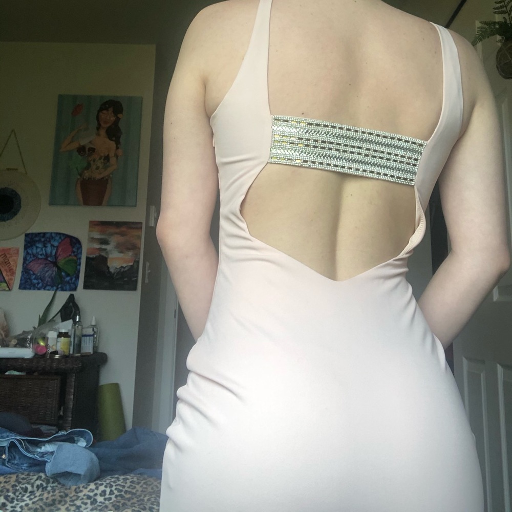 Pink body con dress with beautiful back detail